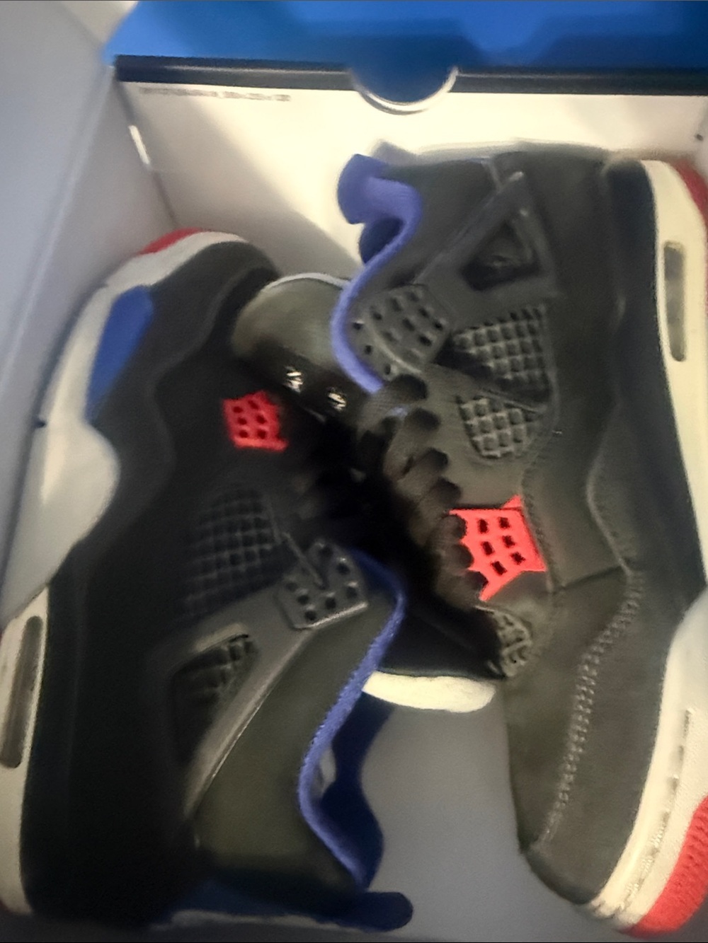 Nike Kids Black Sneakers with Red and Blue Accents
